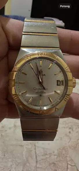 Omega constellation red gold