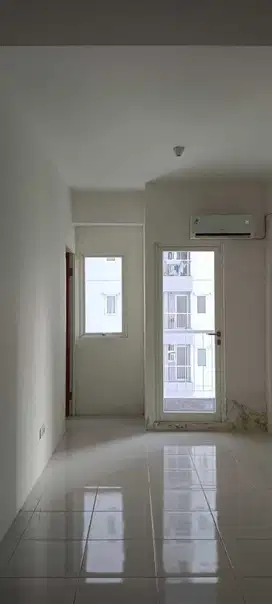 Disewakan Apartemen Puncak Dharmahusada 2BR Kosongan +AC 1 Dekat UNAIR