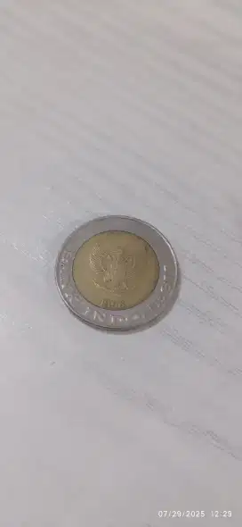 Silahkan dibeli, uang koin seribu rupiah tahun sembilan enam