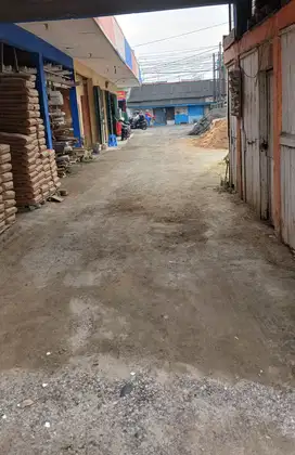 JUAL TANAH & BANGUNAN 1006 m2 samping Jalan Raya M.TABRANI BEKASI