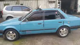 Jual mobil ford laser 1995