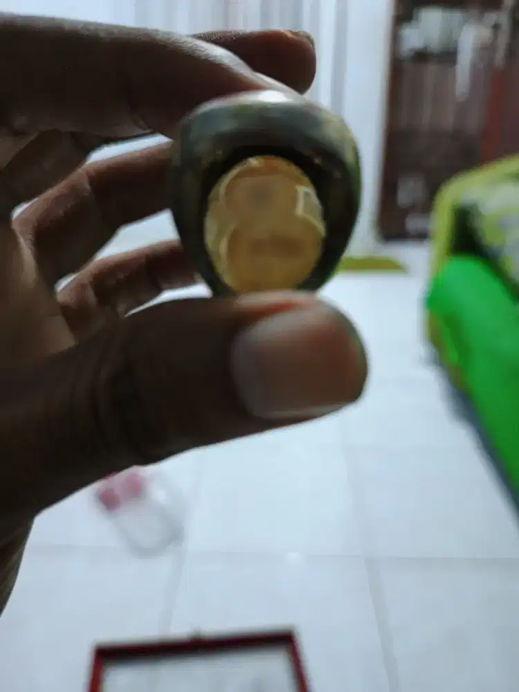 Batu cincin matakucing dan angka 8