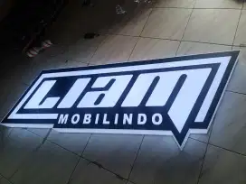 Neonbox lampu plang nama toko