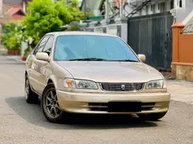 Toyota Corolla All New 1.8 SEG Matic Coklat Met 1999 No Ganjil 69 JT