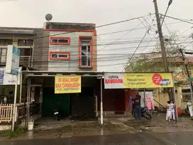 Ruko dua lantai dan Tanah lebih