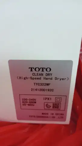 Pengering tangan merk toto