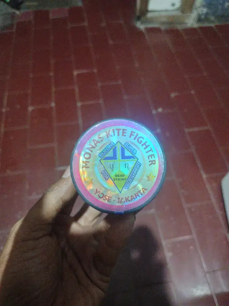 Gelasan cap monas original untuk turnamen aduan