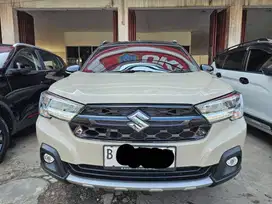 Suzuki XL7 Alpha Hybrid At [Matic] 2023 Coklat Km Low 7 Ribuan