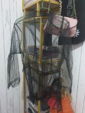 Baju pesta luaran transparan