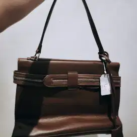 Ta wanitatas kulit coklat