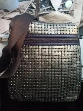 Tas selempang model sling