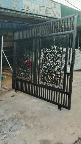 Pagar pintu besi