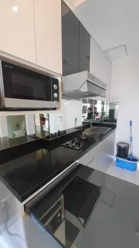 Apartemen Terawat 2BR di Puncak Dharmahusada Surabaya.