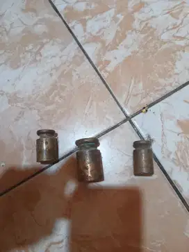 Bandul timbangan kuningan