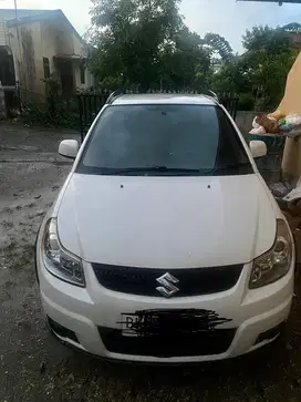 Dijual mobil Suzuki X - over tahun 2010. Sehat