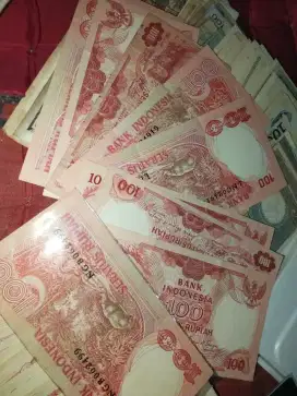 Uang 100 seri badak