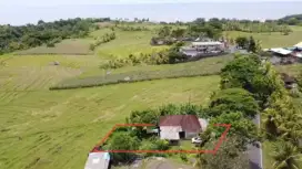 Jual tanah isi bangunan toko di Jl Utama Pantai Soka Tabanan Bali