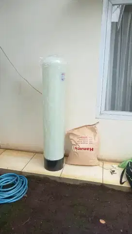 Pemasangan filter air dan instalasi pipa air dan toren air