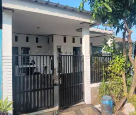 Over kredit rumah