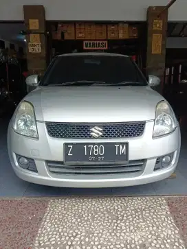 Bismillah numpang mobil S Swift metic no. Z silver.