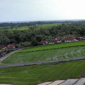 Di jual tanah dekat pantai dengan pemandangan sawah dan gunung