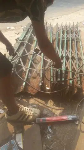 Tukang reparasi pintu rolling door panggilan cepat