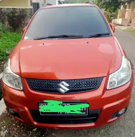 SUZUKI SX4,AUTOMATIC,THN 2011,WARNA ORANGE