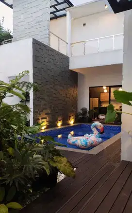 RUMAH MODERN DENGAN KOLAM RENANG PRIBADI di Cibabat Cimahi Harga Nego