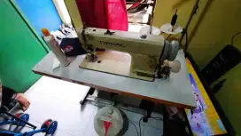 Mesin jahit dengan motor