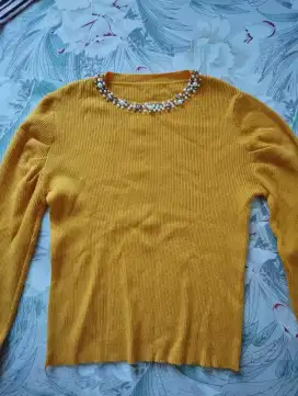 Kaos Rajut Manik