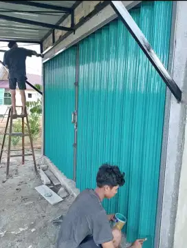 Folding gate rolling door