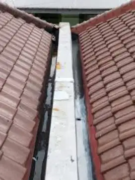 Tukang perbaikan atap bocor dinding dak rembes talang air renovasi DLL