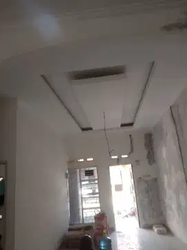 Pelapon gipsun partisi sekat ruang