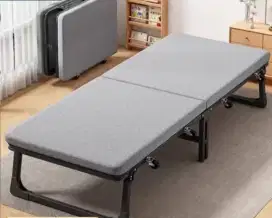 Tempat tidur lipat portable