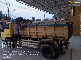 Jasa buang puing tanah