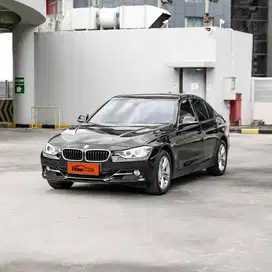 Bmw 320i Sport 2.0 AT hitam 2014 pakai 2015