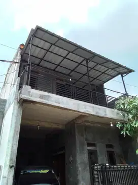 Rumah LB 135 SHM dekat Plaza Taman Harapan Baru Siap KPR J-32791
