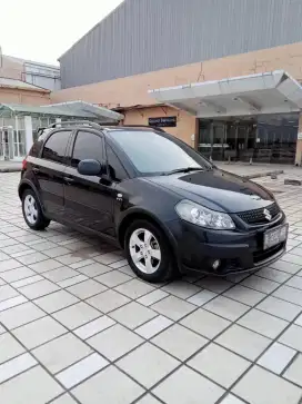 Suzuki SX4 X over MT 2011 antik tangan pertama