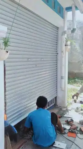 Rolling door folding gate kanopi