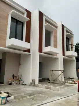 Rumah siap huni pinggir jalan raya pengasinan Depok dalam cluster