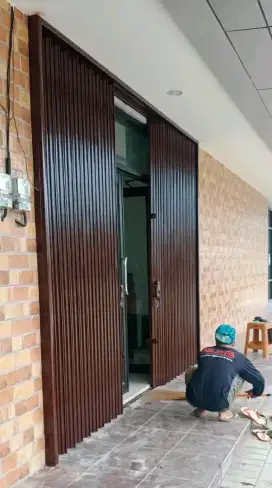 spesialis servis rolling door murah