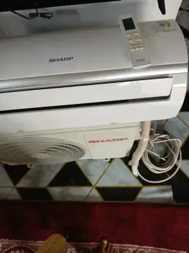 jual ac sharp 1/2 pk r32 low wat,1 thn pakai.