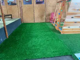 Rumput sintetis area bermain anak