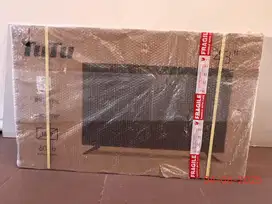 Smart TV 43” merk Tutu baru belum di buka masih dalam karton