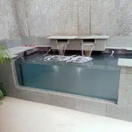 Tukang kolam kaca-kolam natural-kolam relif-tukang taman-kolam