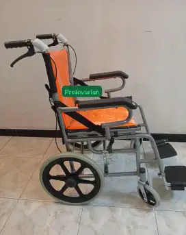FOLDED TRAVEL WHEELCHAIR  - BNOB