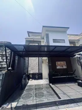 dijual rumah style villa lantai 3 lokasi sibang gede