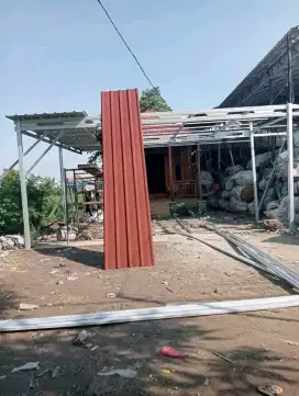 Tukang renovasi dan atap