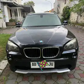 BMW X1 sDrive 18i AT 2012 hitam plat AB bantul