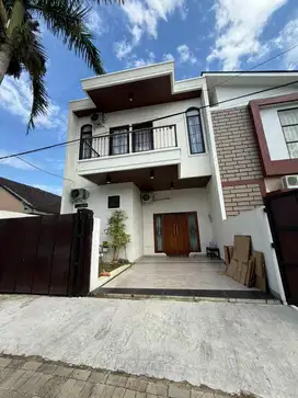 Rumah lantai dua
